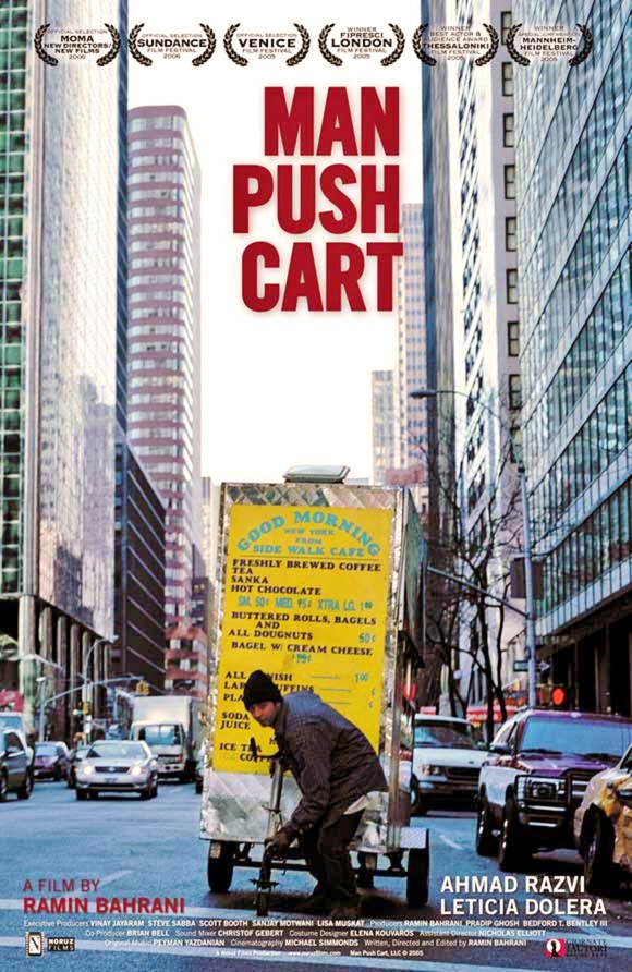 Photo of Man Push Cart